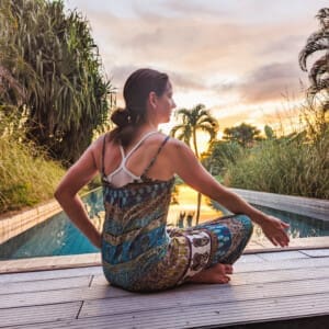 Health coach Mandy Torres sitting poolside, image for blog about finding purpose